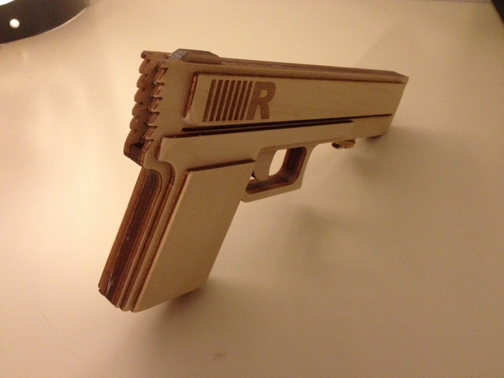 Laser Cut Rubberband Gun Free Vector