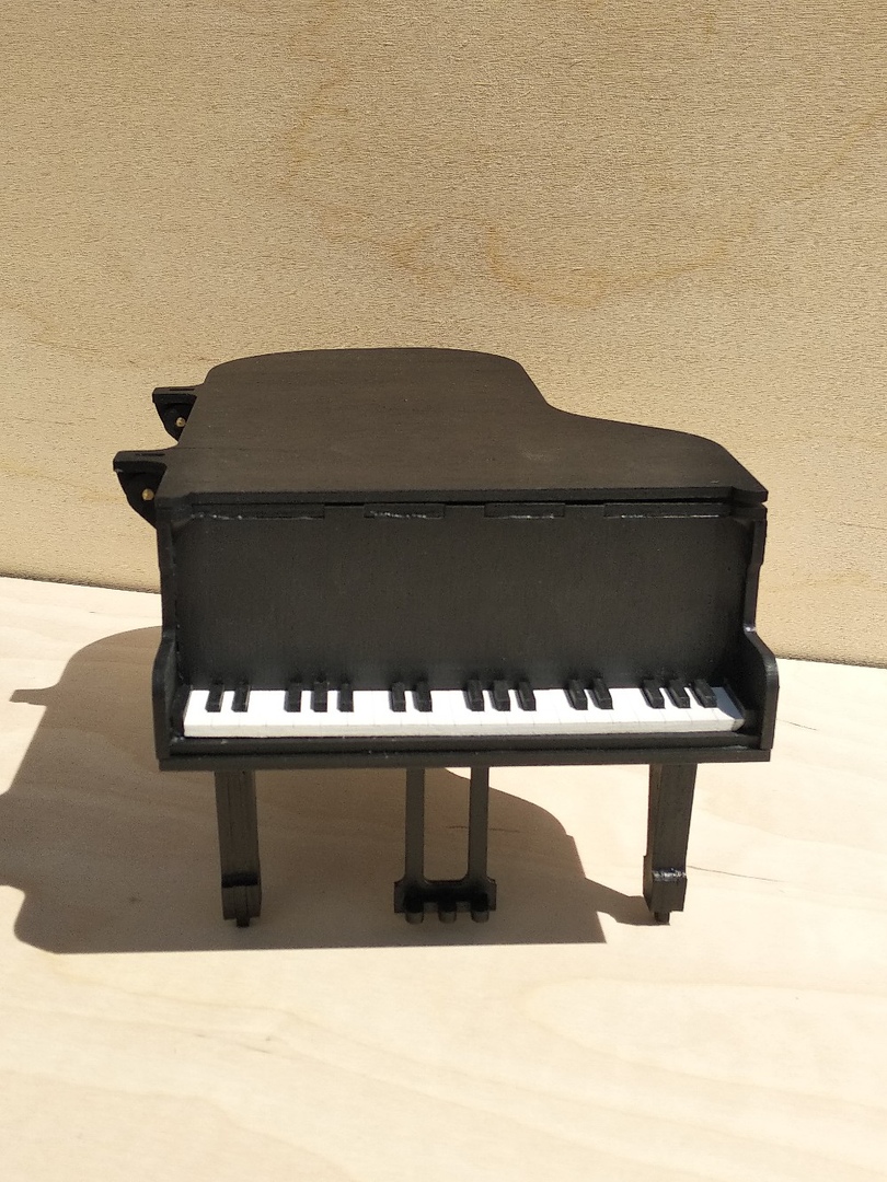 Laser Cut Piano Shaped Box Free Vector