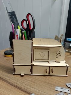 Laser Cut Desk Storage Organizer With Miniature Television Free Vector