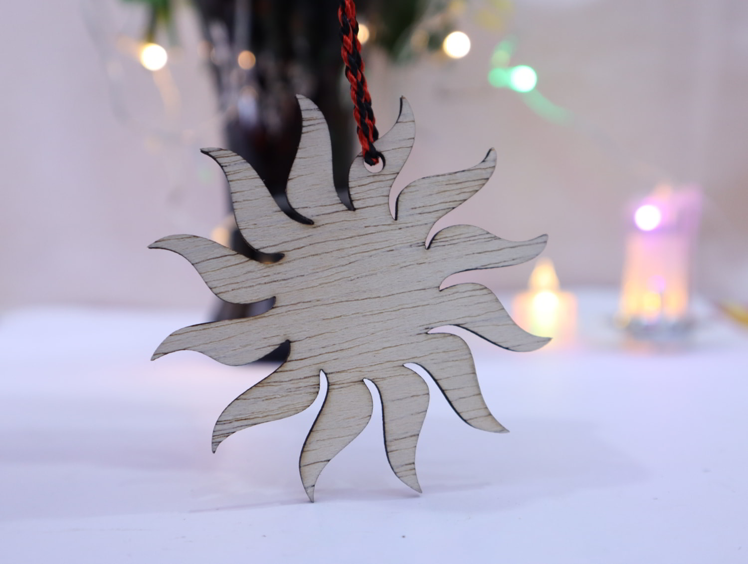 Laser Cut Sun Christmas Wooden Ornament Free Vector