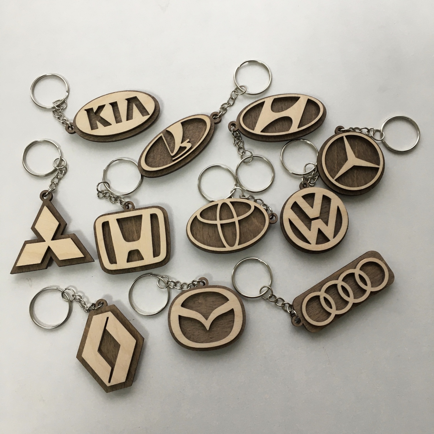 Laser Cut Car Logo Keychains Wooden Car Key Rings Free Vector cdr