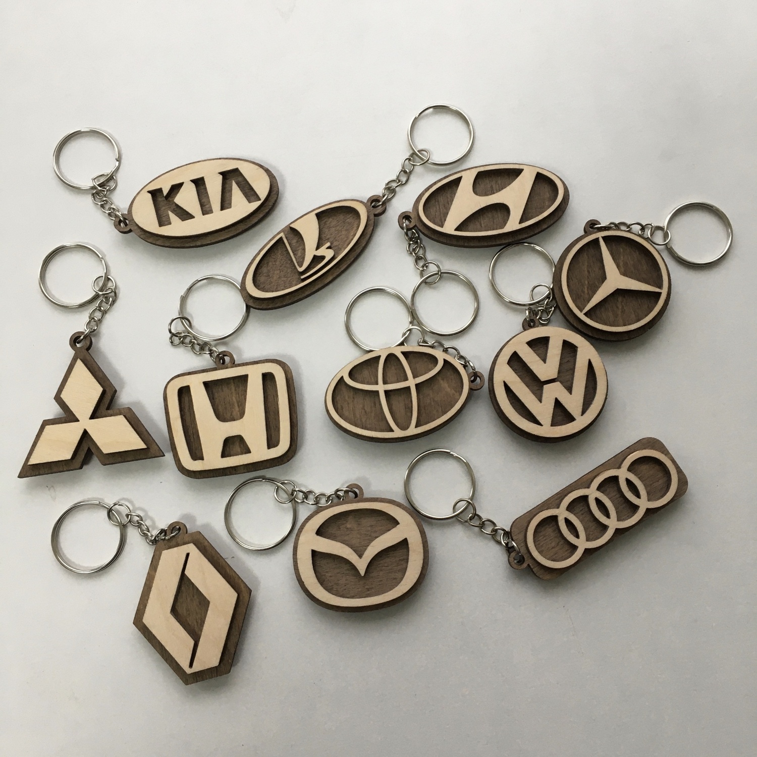 Laser Cut Car Logo Keychains Wooden Car Key Rings Free Vector Cdr 