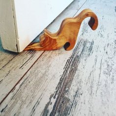 Cat shaped door wedge Free Vector