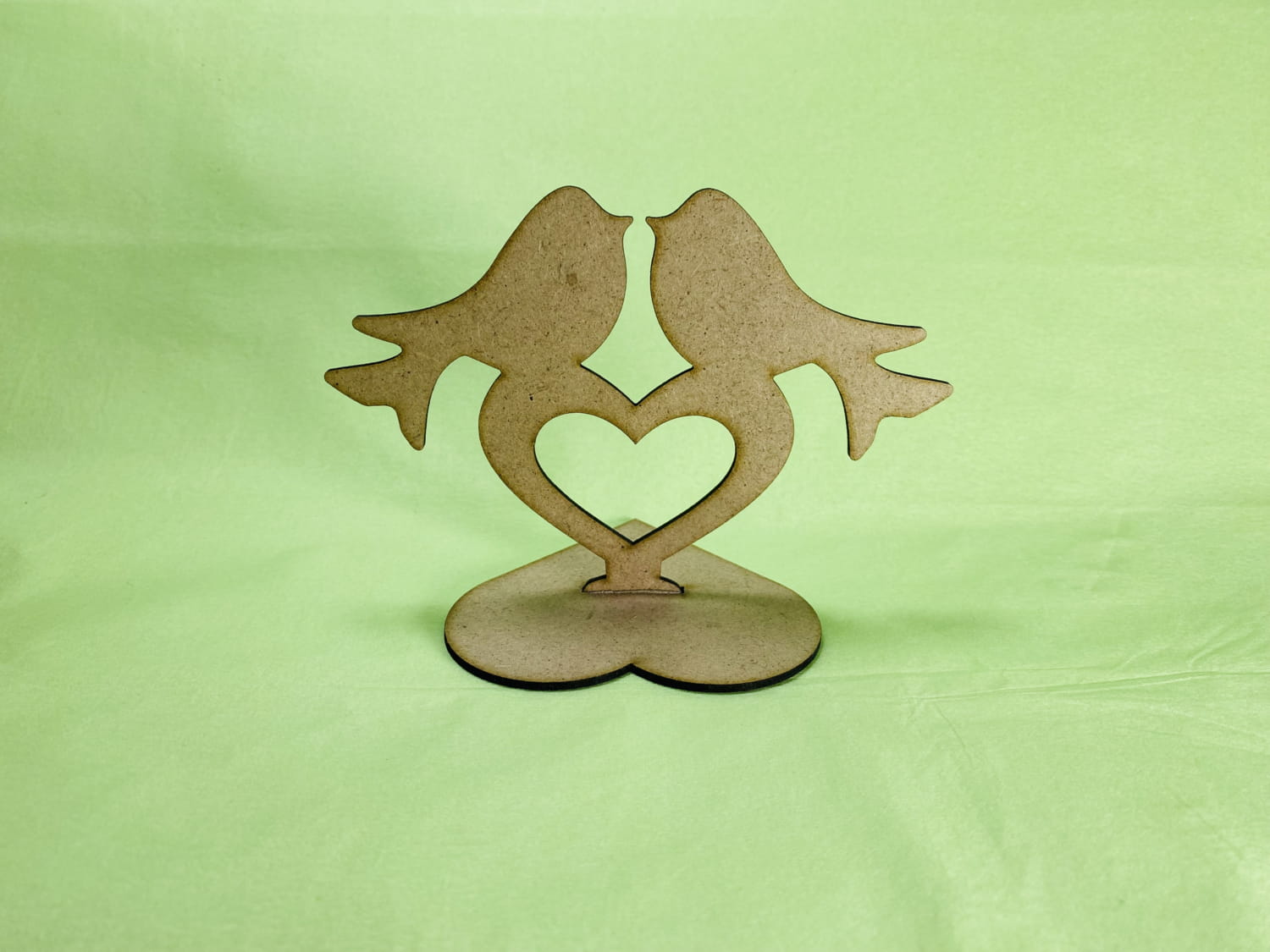 Laser Cut Love Birds On Heart Stand Free Vector