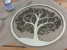 Laser Cut Tree in Circle Free Vector