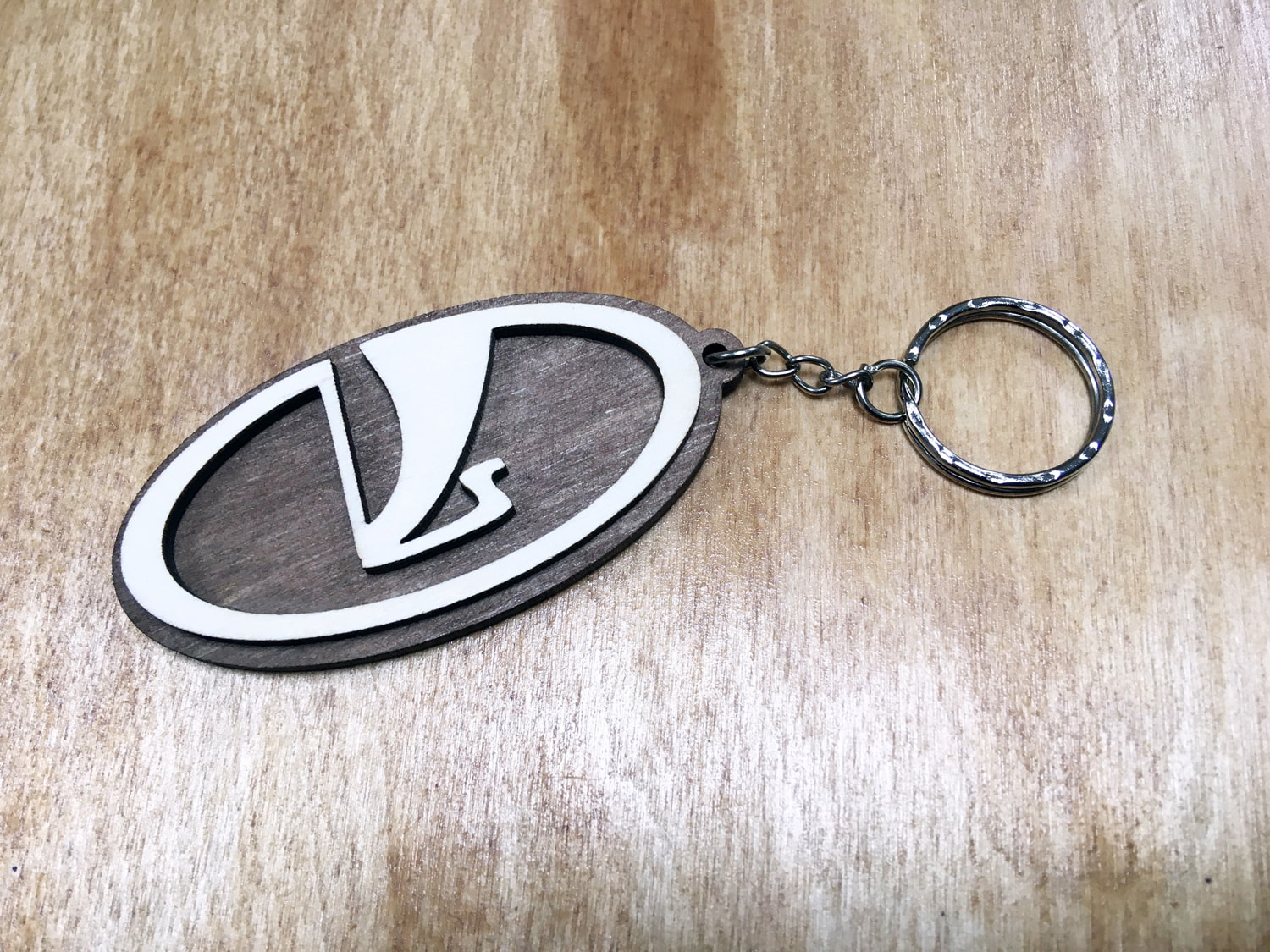 Laser Cut Car Logo Keychains Wooden Car Key Rings Free CDR Vectors