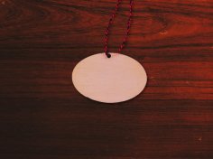 Laser Cut Oval Shape Wood Ornament Free Vector